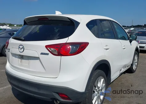 2015 Mazda Cx-5 Grand Touring z USA, uszkodzony, nr VIN JM3KE4DY9F0490276